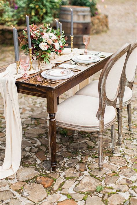 Winery Vow Renewal Inspiration With Autumn Leaves Rustic Wooden Table