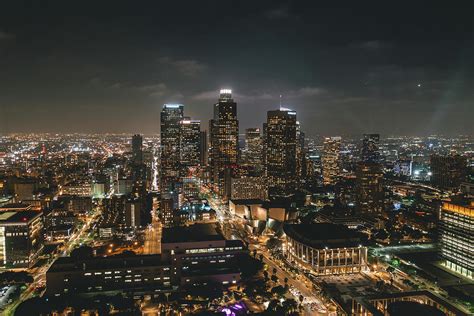 Aerial View Of Downtown Los Angeles Skyline With City Lights From