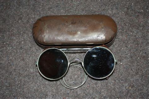 A Wwii Pair Of The Raf Am Marked Tin Sunglasses