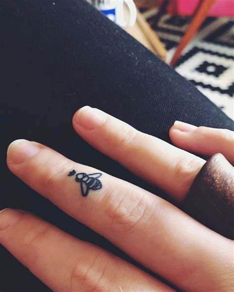 35 Amazing Tiny Finger Tattoos Ideas
