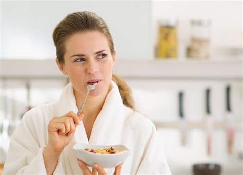 Weightlossvillage Blog Archive Happy Young Woman In Bathrobe Eating