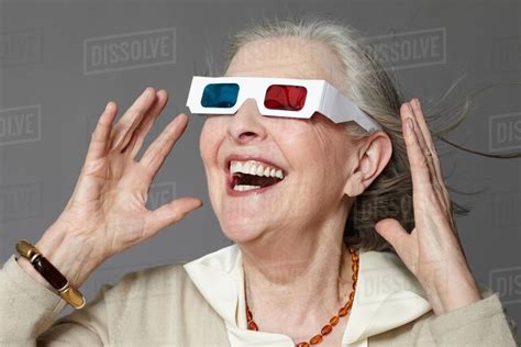 Senior Woman Wearing 3d Glasses Stock Photo Dissolve