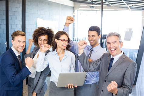Premium Photo Happy Business Team Celebrating A Success In Office