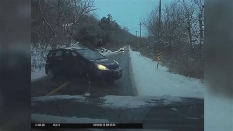 Black Ice Sends Car Slamming Into Police Cruiser Video
