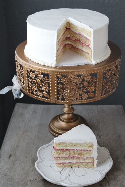 The bridal shower theme has been chosen, invites have gone out, the food is being finalized and now it is time to start planning the dessert table. Lemon Raspberry Layer Cake- The Little Epicurean