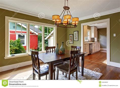 Dining Room With Olive Tone Walls Stock Photo Image Of Cabinets