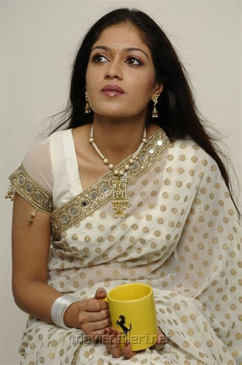 Actress Meghana Raj In White Saree Photoshoot Stills