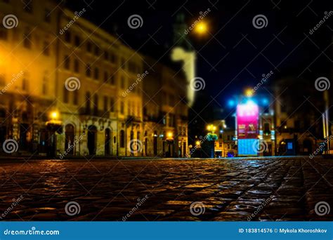 Illuminated Street Of Old European Town At Night Stock Photo Image