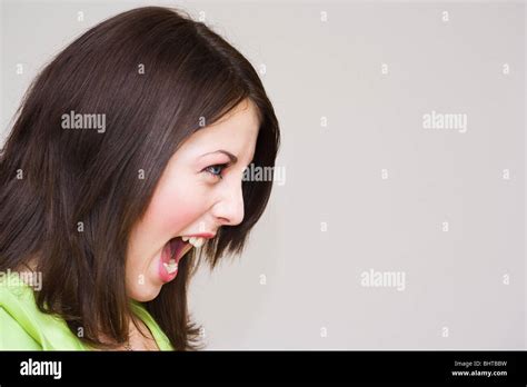Close Up Portrait Of A Beautiful Woman Screaming Stock Photo Alamy