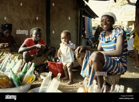 Market Trader Girl With Brother And Sister African Market Mamie