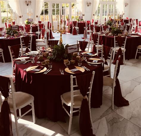 Burgundy And Rose Gold Wedding Tables At Wedding