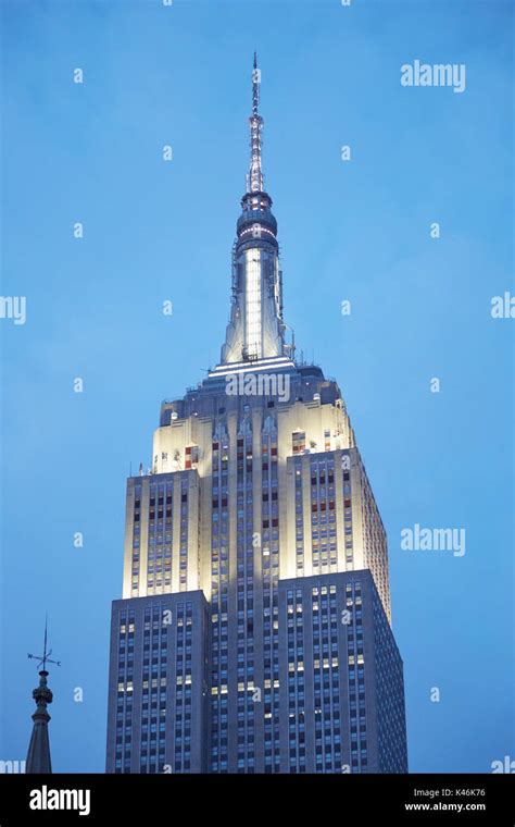 Empire State Building Upper Part From Fifth Avenue Illuminated In The