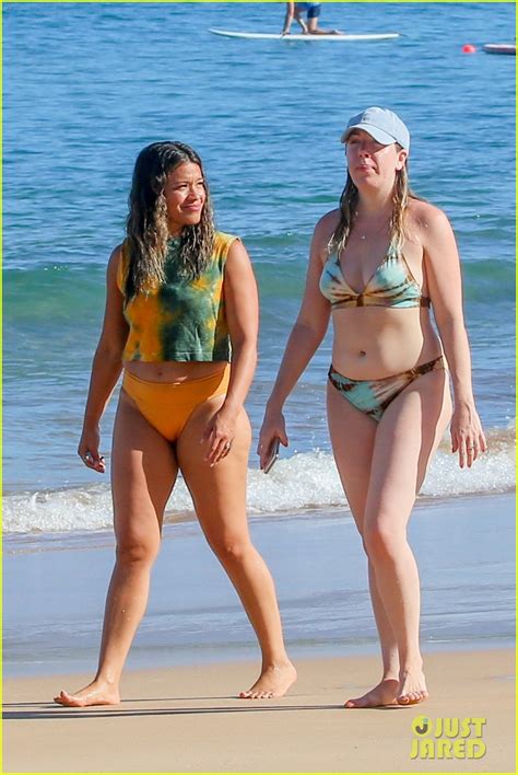 Gina Rodriguez Wears Orange And Green Tie Dye Bikini At The Beach In