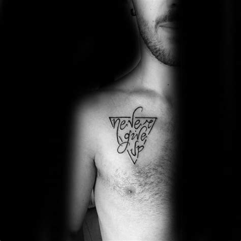 This tattoo is not a simple letter but can be described in many different. 60 Never Give Up Tattoos For Men - Phrase Design Ideas
