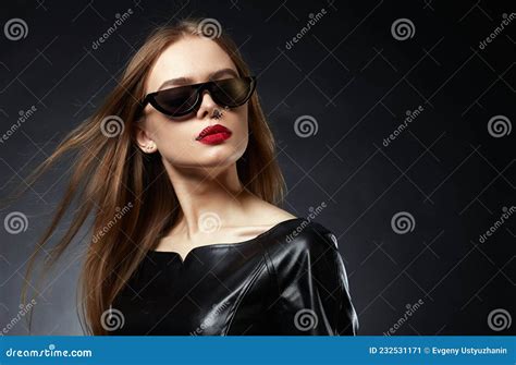 Fashion Portrait Of Beautiful Woman In Sunglasses And Leather Stock