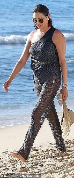 lauren silverman wows in one shoulder swimsuit and mesh cover up in barbados daily mail online