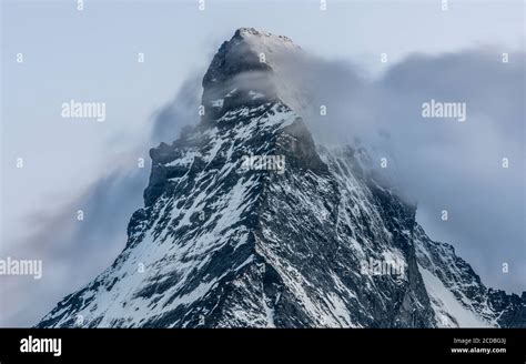 Long Exposure Shot Of Matterhorn Snowy Mountain Summit With Cloud