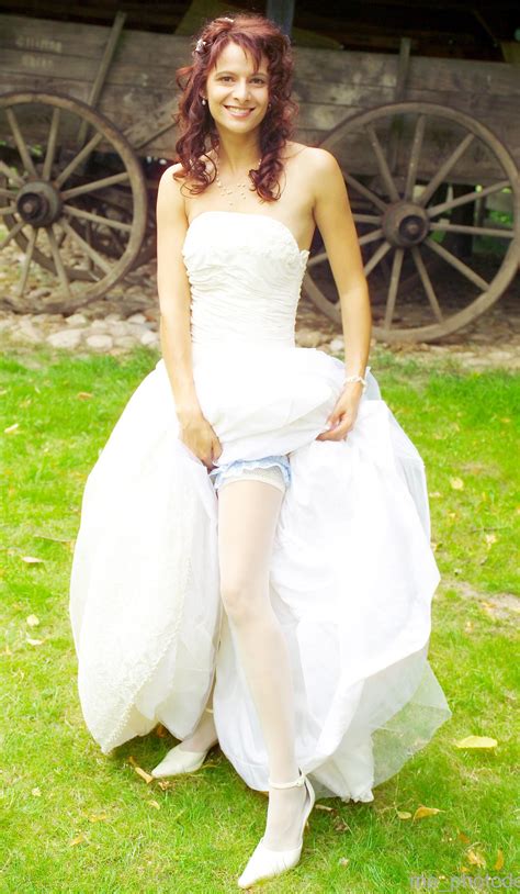 Redhead Bride Wearing White Opaque Stockings And White Long Dress