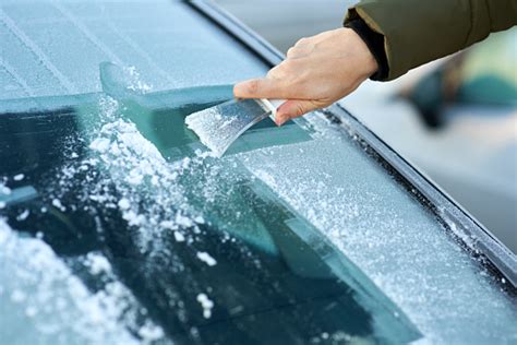 Scraping Ice Off The Windshield Stock Photo Download Image Now Istock