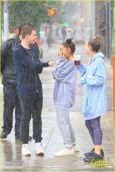 Ariana Grande Walks Through The Pouring Rain With Her Best Friends