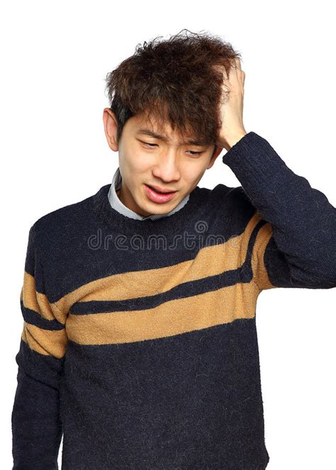 Closeup Portrait Stressed Young Asian Man Hands On Head With B Stock