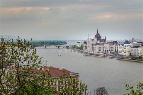 Budapest City Landscape With The Hungarian Parliament Building In The Background On A Cloudy Day