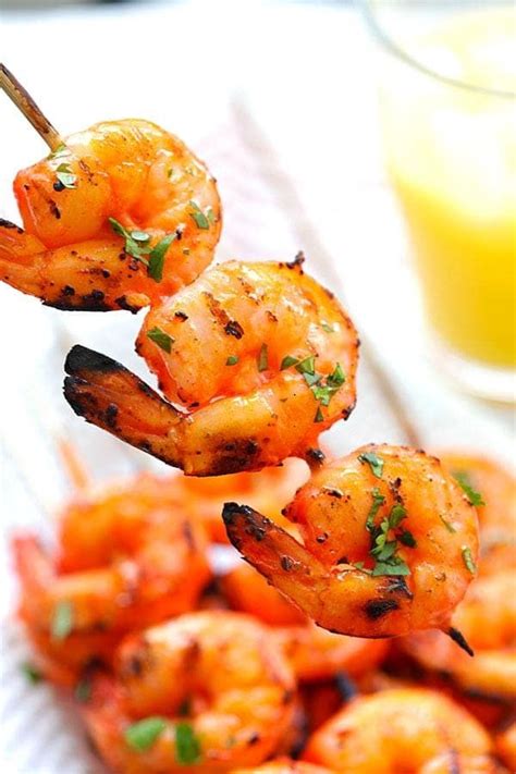You know it's done when it curls up and turns pink. Tandoori Shrimp - perfectly marinated and grilled Indian Tandoori shrimp skewers. Super easy ...