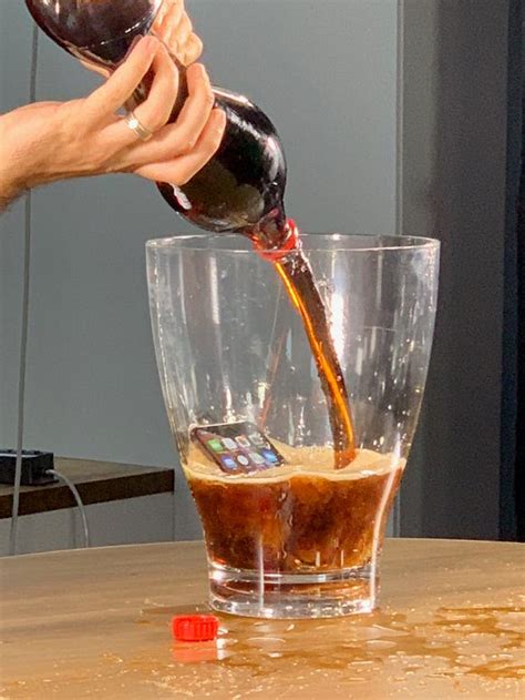 Iphone Xs Torture Test We Dropped One In Beer Water Coffee And Soda