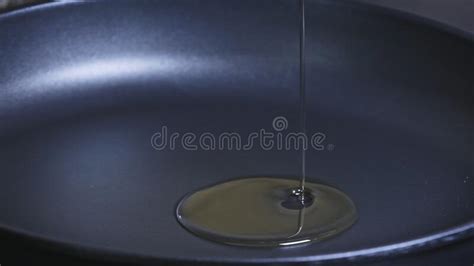 Pan With Oil Cook Pours Sunflower Oil Into A Frying Pan Macro Shot Stock Image Image Of