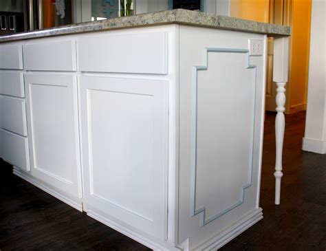 Soft blue kitchen cabinets with wainscoting backsplash. Nifty Thrifty Momma: My Dream Kitchen Part 1: Painting our ...