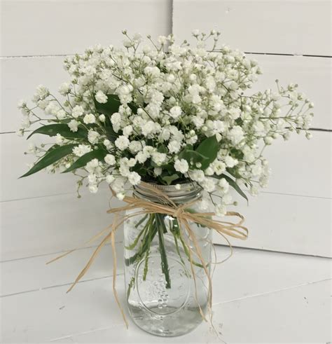 Mason Jar Centerpieces With Babies Breath Ruscus And