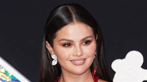 Selena Gomez’s Take On The Naked Dress Trend Is A Red Floral Lace Number