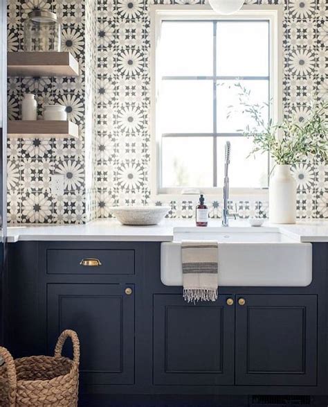 Moroccan mosaic and tile house type/style: Moroccan tiles on kitchen wall with open shelving and navy ...
