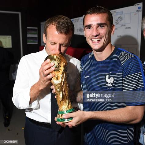 French President Emmanuel Macron Poses With Antoine Griezmann During