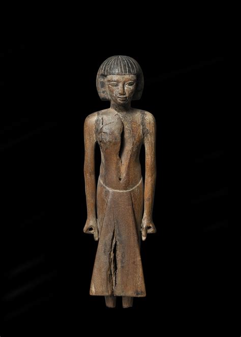 Egyptian An Egyptian Wood Figure Of A Man New Kingdom 18th Dynasty