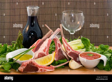 A Ready For Cooking Dinner With Rack Of Lambs Stock Photo Alamy