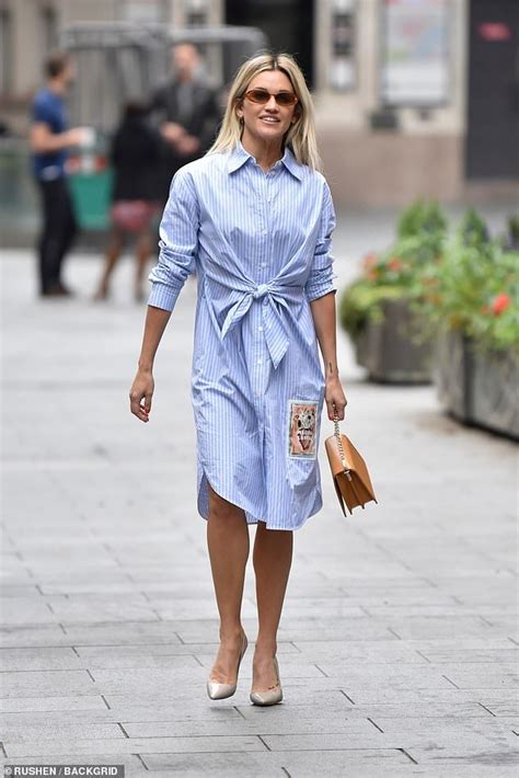 Ashley Roberts Showcases Her Toned Legs In A Pinstriped Shirt Dress