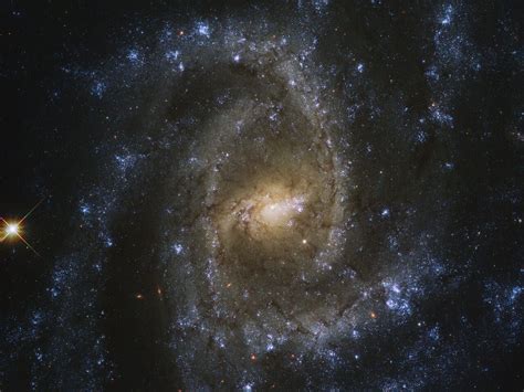 The Hubble Telescope Captured A Stunning Photo Of The Distant Spiral