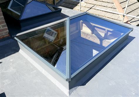 Flat Roof Rear Extension Featuring Two Aluminium Roof Lanterns Exact
