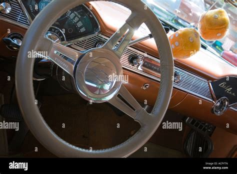 Dashboard And Steering Wheel Inside A Gold Chevrolet Bel Air Classic