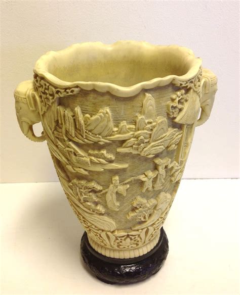 A Large Early 20thc Faux Ivory Vase With Elephant Handles And A Scenic