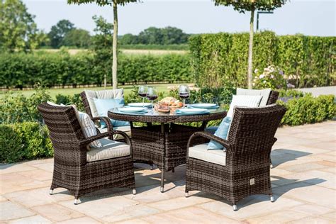 Wood outdoor dining sets from patioliving are sets that are manufactured from natural wood materials and intended for use in an exterior dining setting. Maze Rattan Texas 4 Seat Round Dining Set | Garden ...
