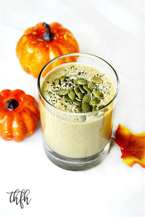 A Smoothie With Pumpkins And Seeds On The Side