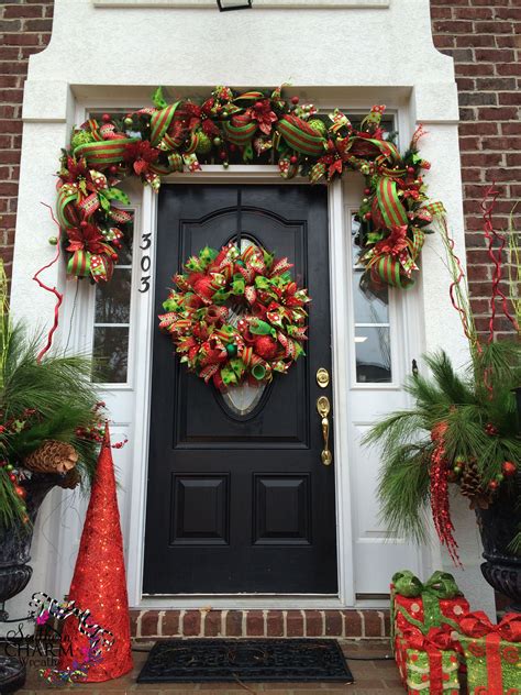 Beautiful Door Decorated With Deco Mesh Christmas Garland And Wreath In