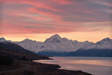 Mountain Covered In Ice Near Body Of Water During Daytime Mount Cook
