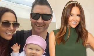 kyly and michael clarke take a winter stroll along the beach with daughter kelsey lee daily