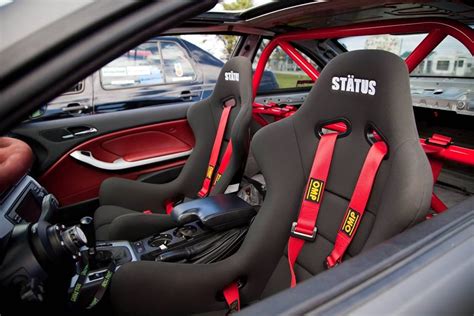 Aggressive Bmw E46 M3 Showcasing Status Racing Ring Seats Status Racing