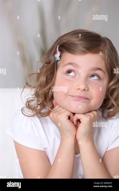Adorable Little Girl Looking Up Stock Photo Alamy