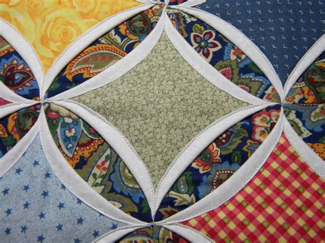 By Cj Cathedral Window Mini Quilt