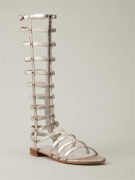 lyst stuart weitzman gladiator sandals in metallic